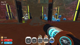 Tabby slimes and rock slimes looking at each other from their corrals in Slime Rancher.